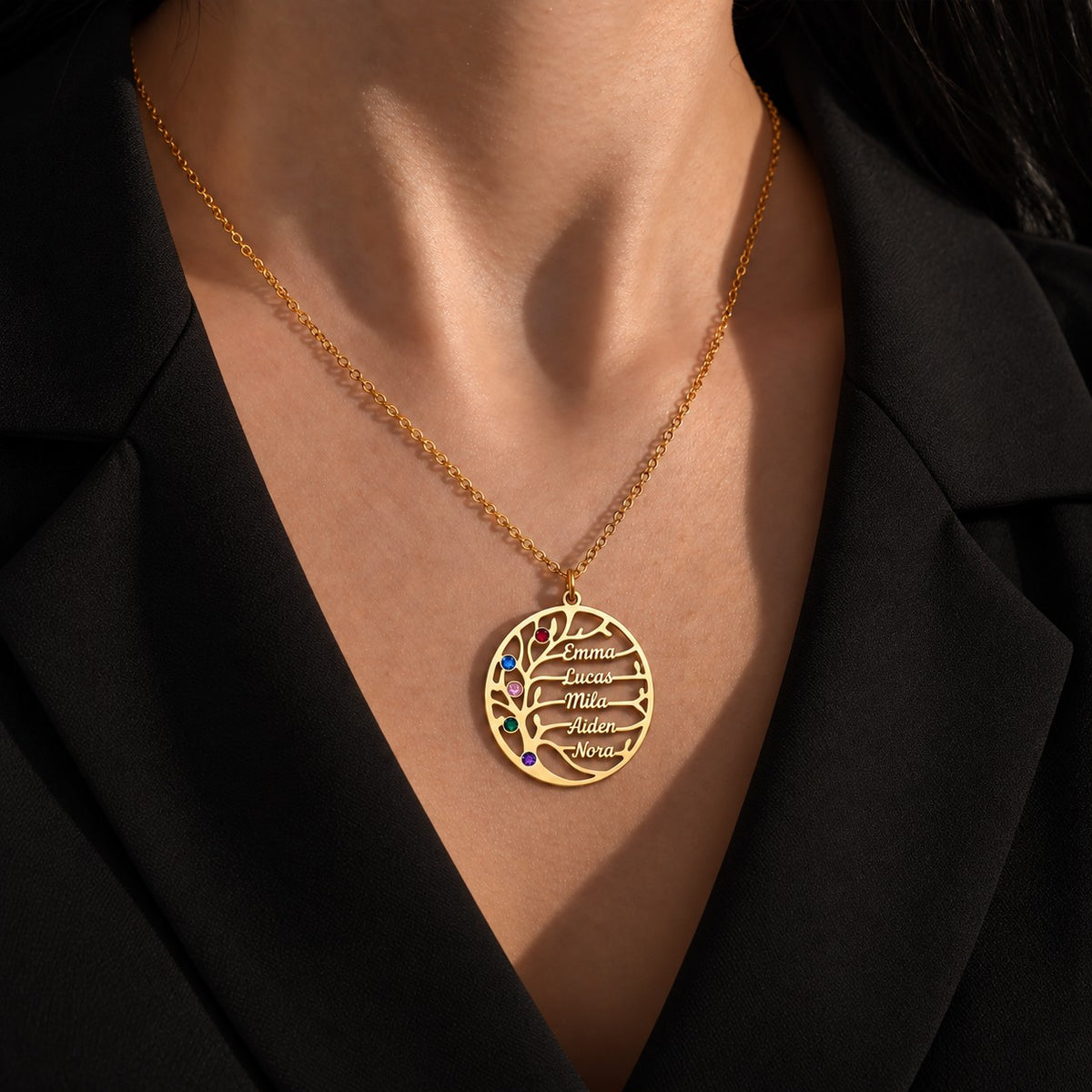Personalized family name necklace shown in gold, rose gold and silver finishes