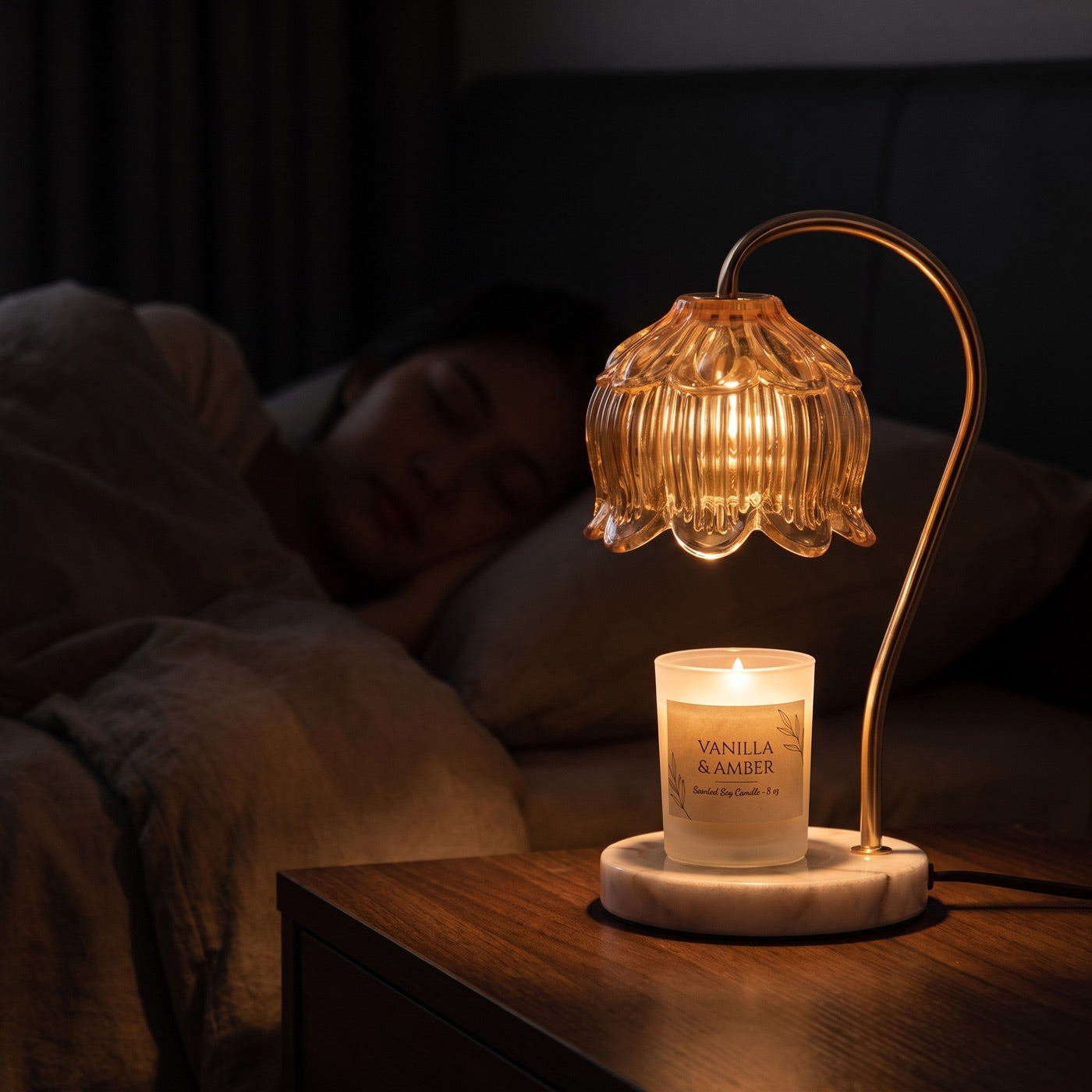 Marble Bloom lamp dimmed to a soft night light in a dark bedroom