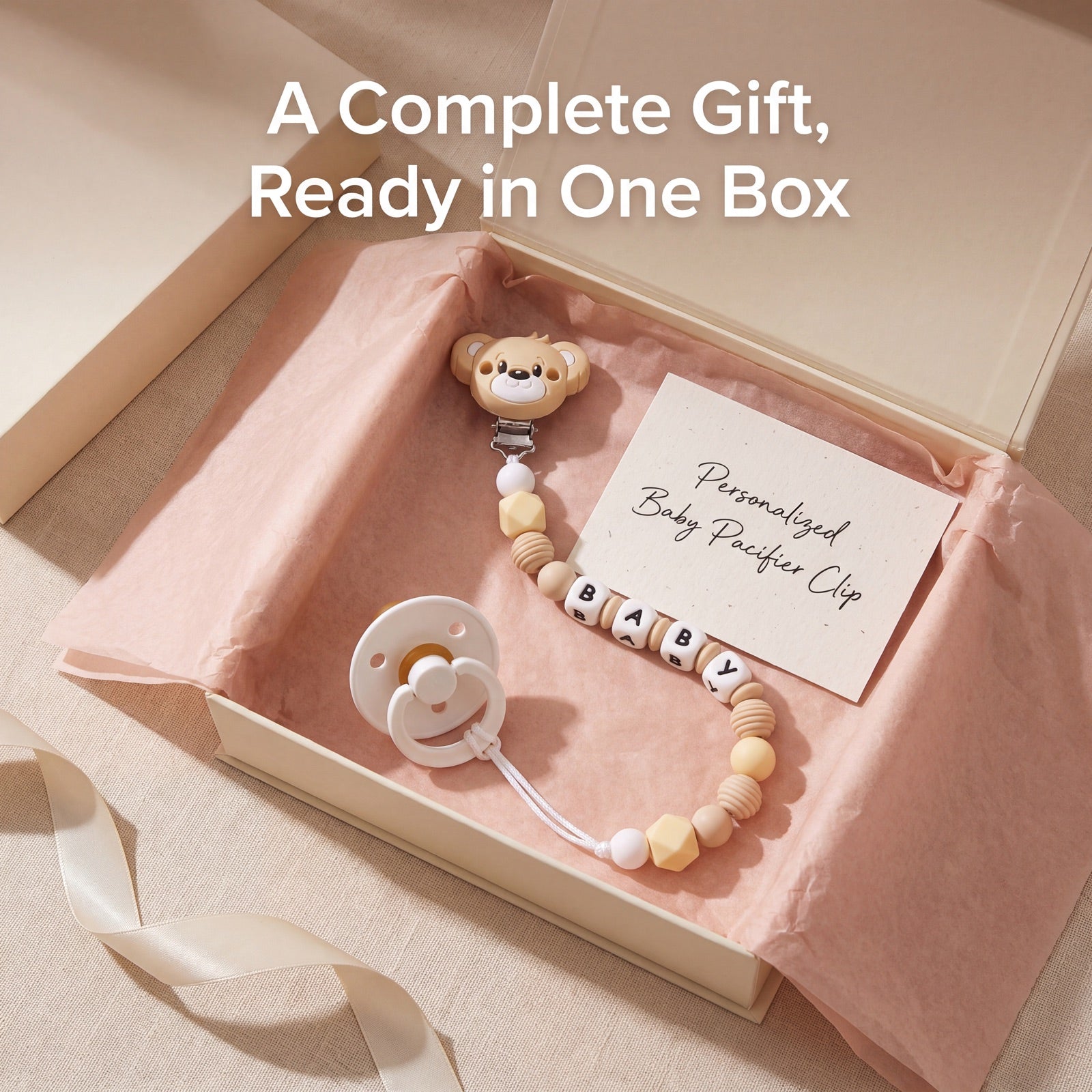 Personalized baby pacifier clip with name beads arriving gift-boxed with tissue paper and card