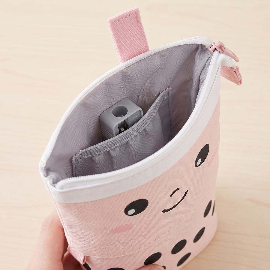 [s] Inside the BobaPop Pencil Case: one roomy compartment with a soft slip pocket