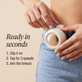 Ready in seconds — clip it on, tap for 3 speeds, aim the breeze