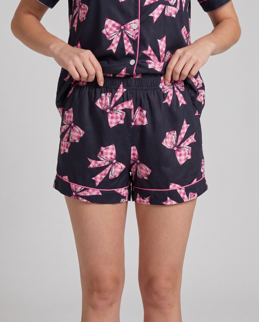 Black Ribbon Dreams pajama set styled together — coquette-coded bow-print loungewear