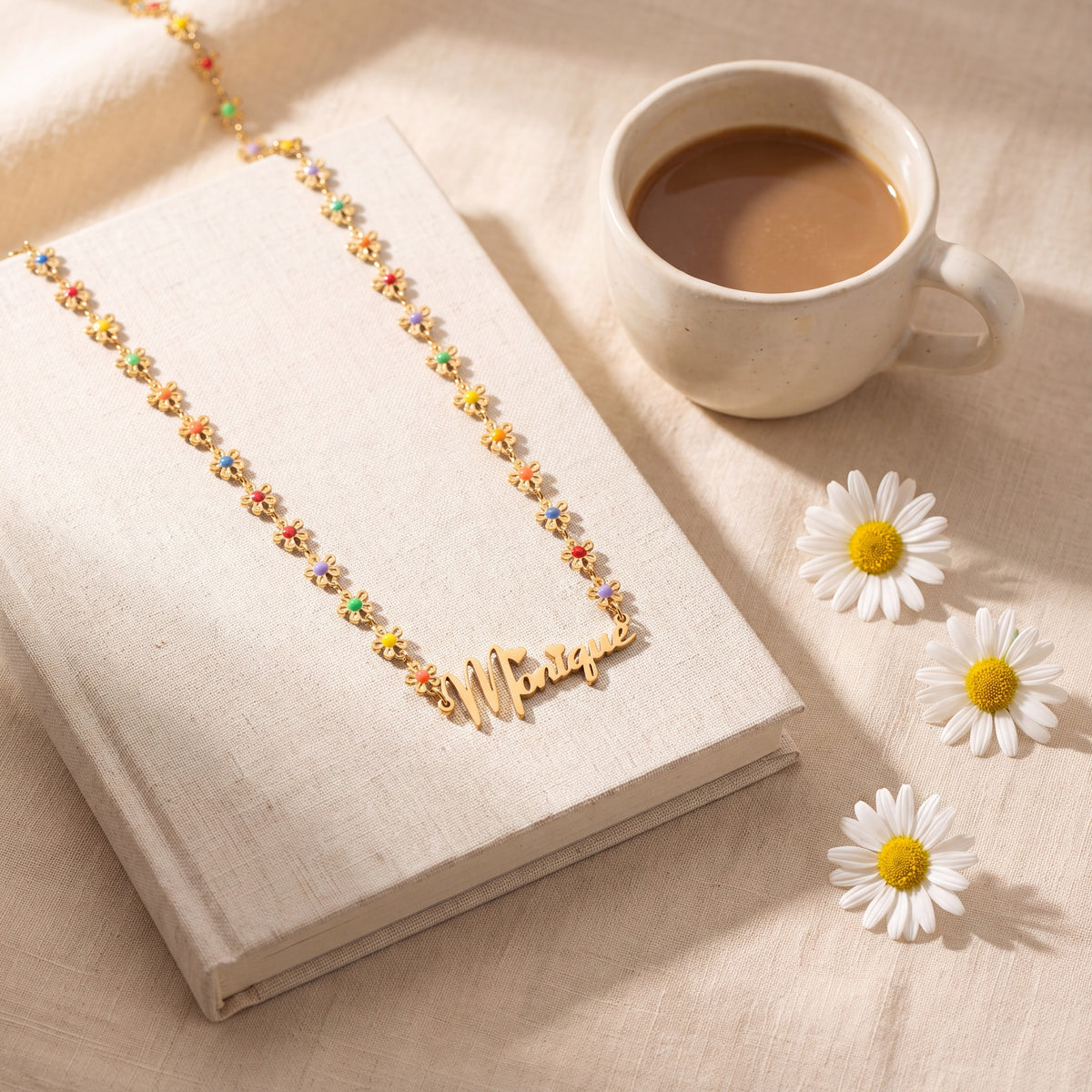 Gold | styled flower name necklace with coffee and daisies