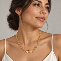 Gold | Ava flower name necklace worn by a woman in her 30s