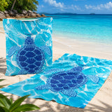 AQUA | Aqua Turtle bag and full-size towel on the sand