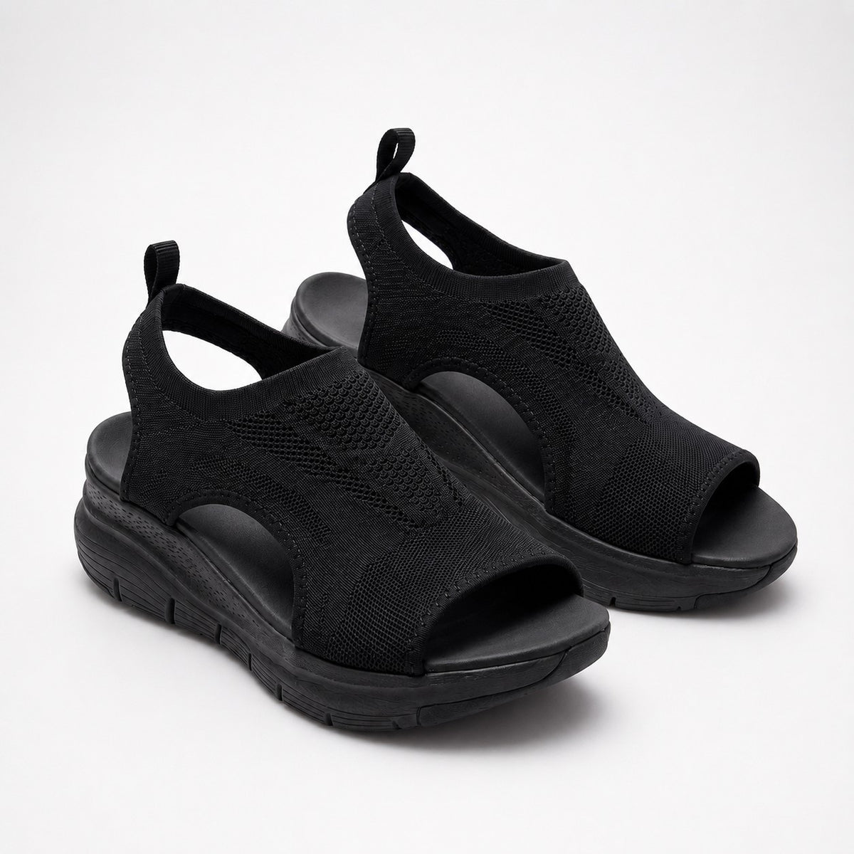 Cloudstep Comfort Sandal in all black — breathable airknit pair with cushioned platform sole, studio view