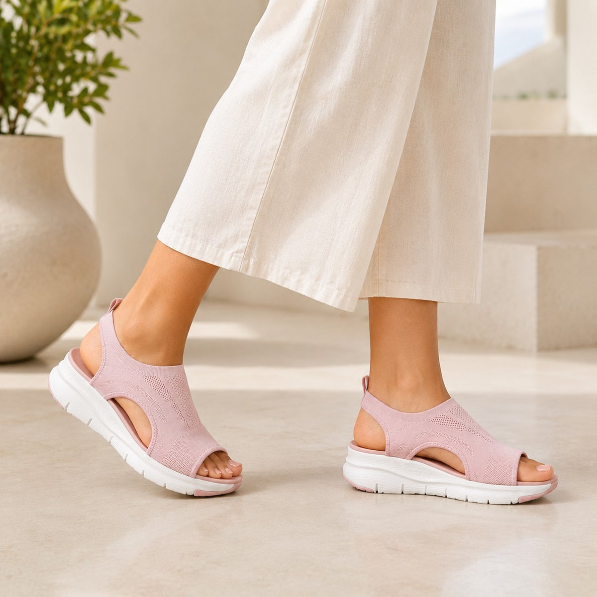 Cloudstep Comfort Sandal blush pink worn walking — airknit flexes with every step