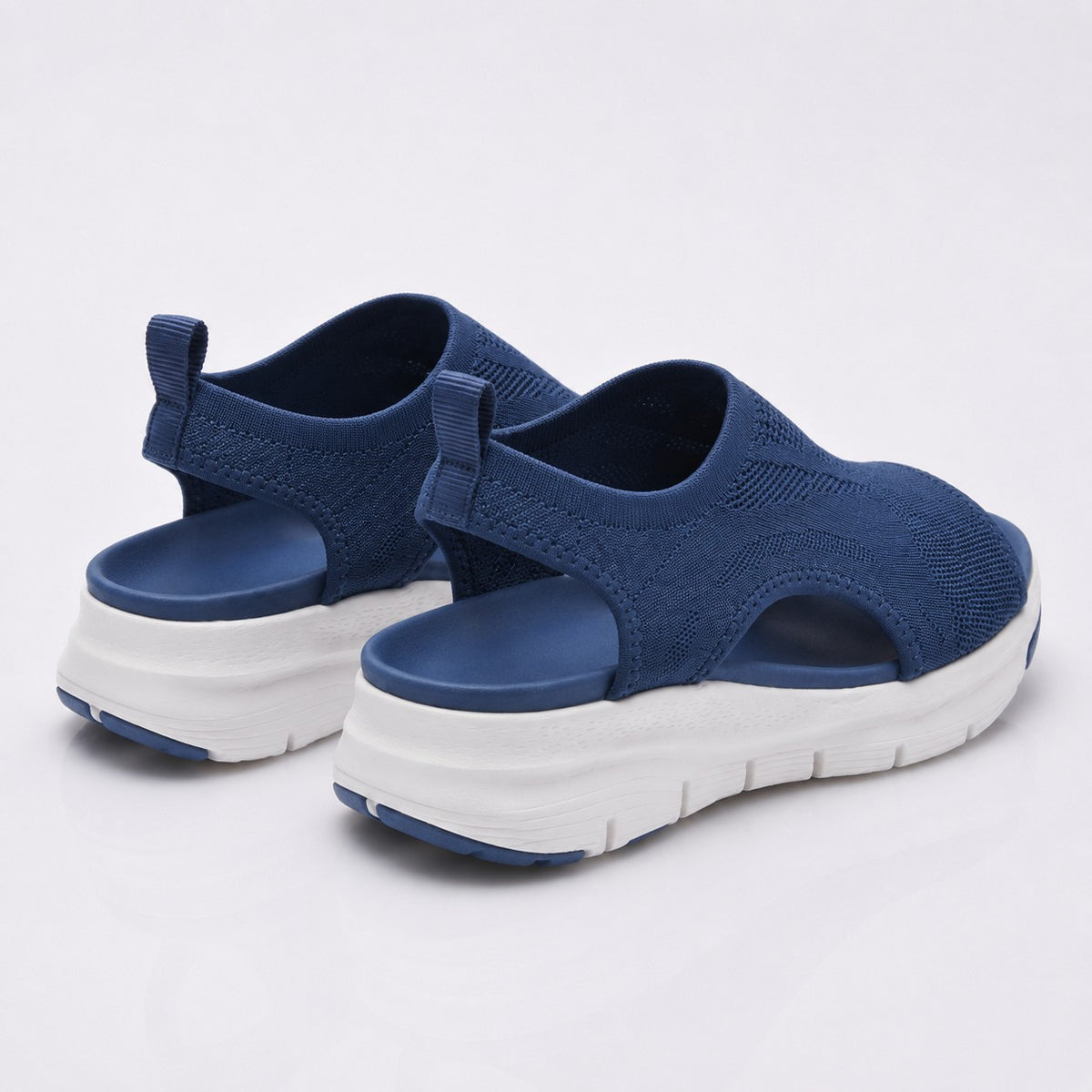 Cloudstep Comfort Sandal navy — back view of elastic slingback and white platform soles