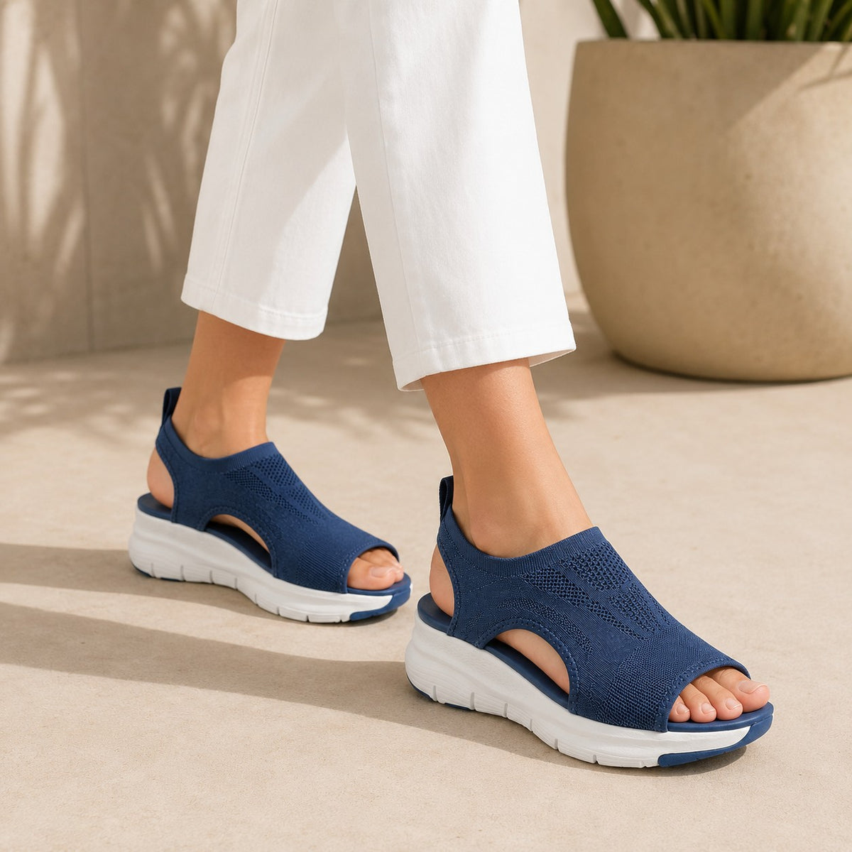Cloudstep Comfort Sandal navy on feet with white pants — everyday summer outfit