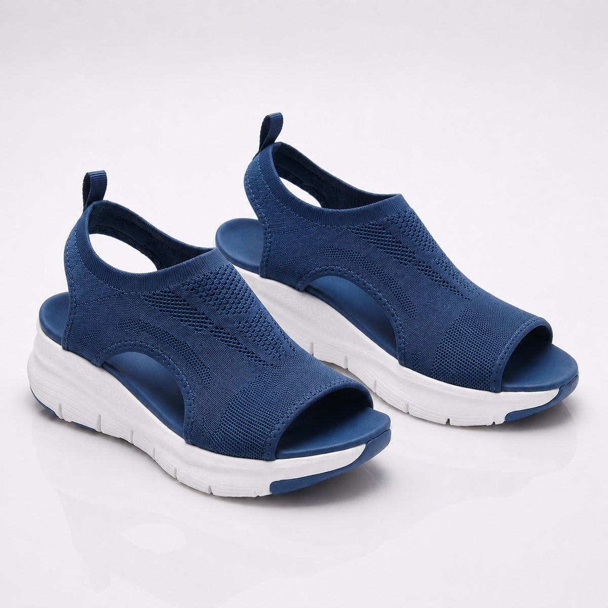 Cloudstep Comfort Sandal navy — angled studio pair showing knit texture