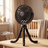 BreezyBuddy 360 Stroller Fan — Black, on nursery table