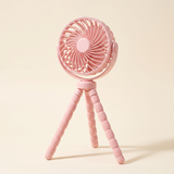 BreezyBuddy 360 Stroller Fan — Pink, standing on flexible tripod legs