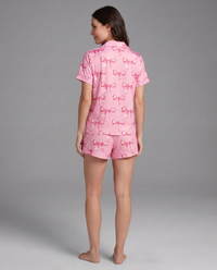 Pink soft stretch pajama set lifestyle shot — dreamy Sunday-morning sleepwear