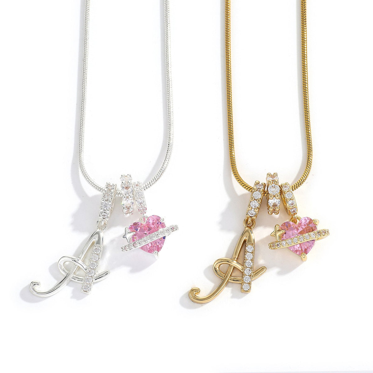 Gold and silver script initial A necklaces with pink heart charms