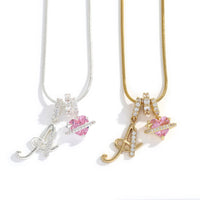 Gold and silver script initial A necklaces with pink heart charms