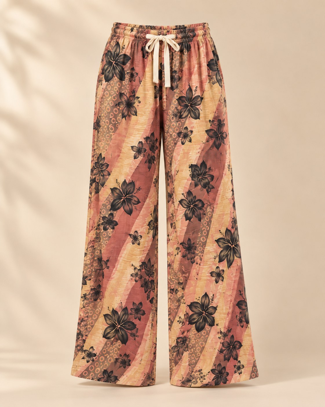 Swaggy Drift Pants in Sunset Bloom Stripe — flat lay