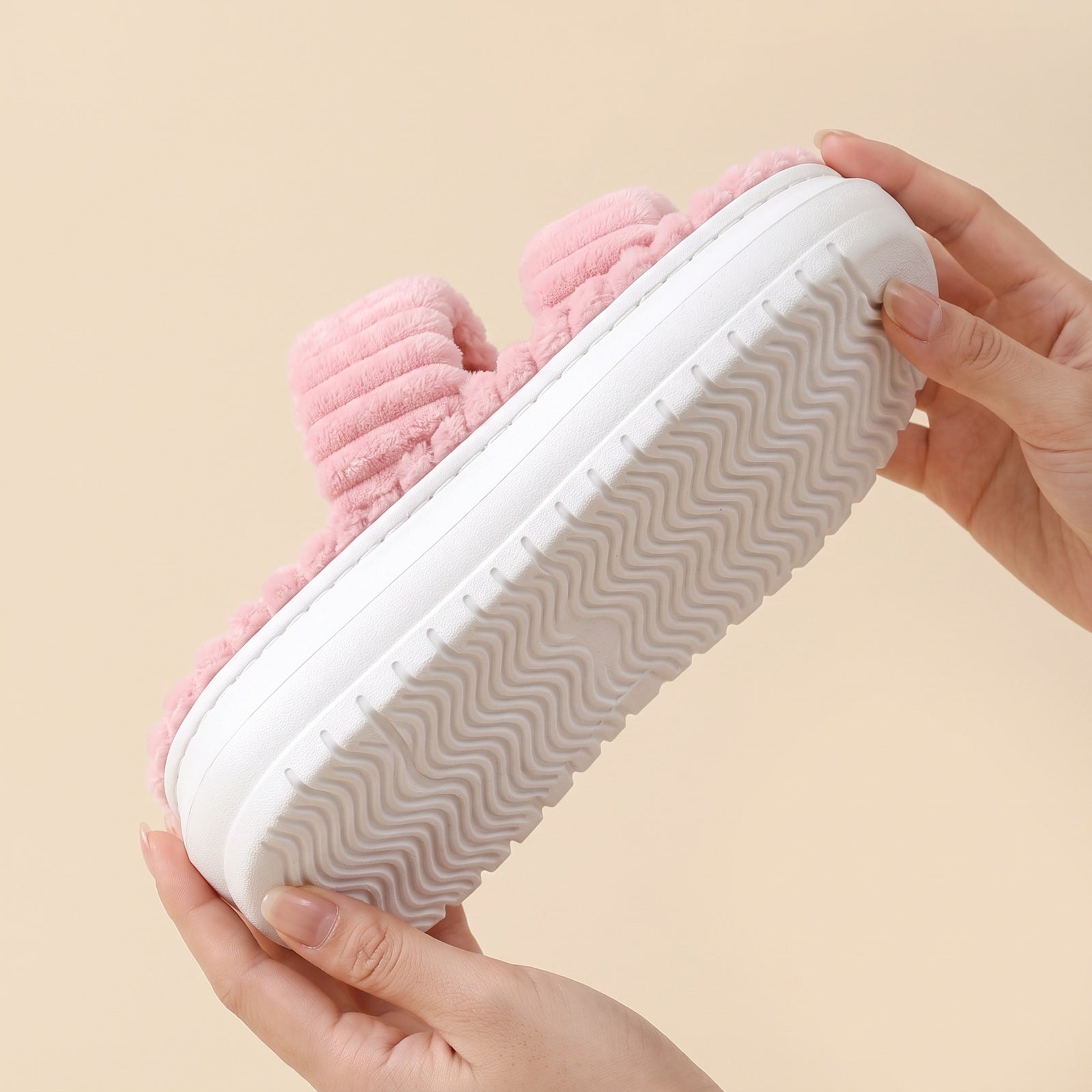 Anti-slip tread pattern on the Cozy Cloud Slippers outsole