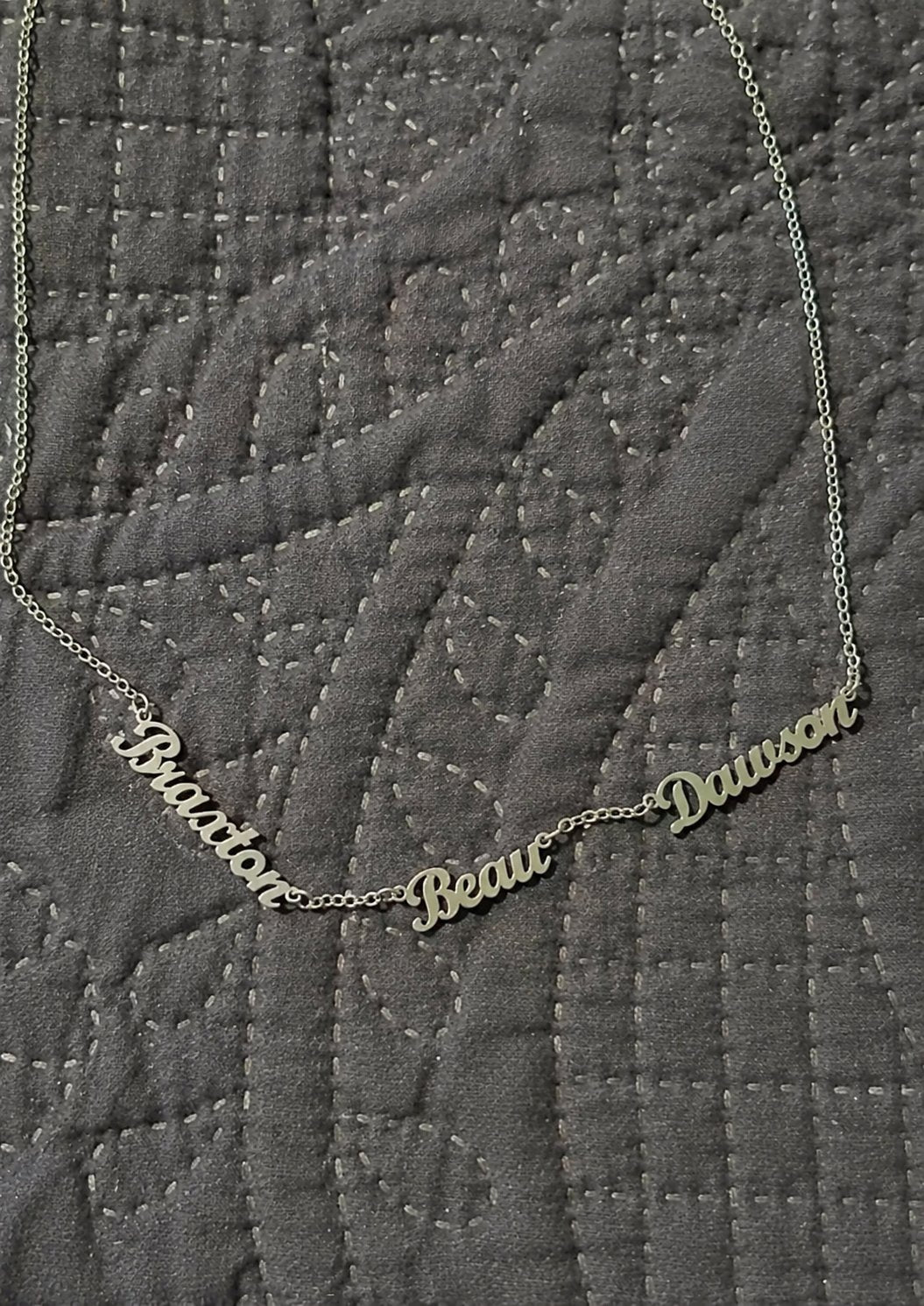 Customer photo — personalized name necklace