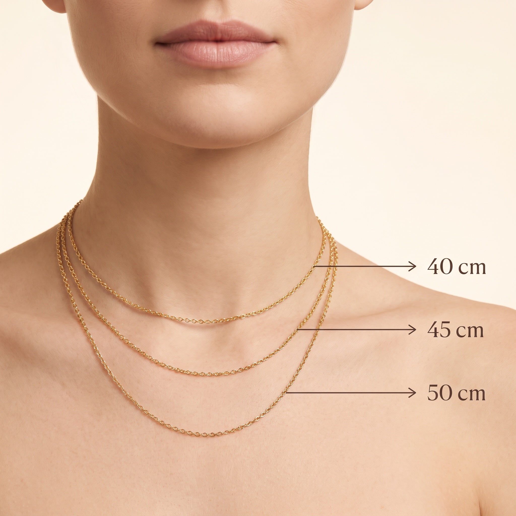 Necklace length guide — 40cm at the throat, 45cm at the collarbone, 50cm on the upper chest