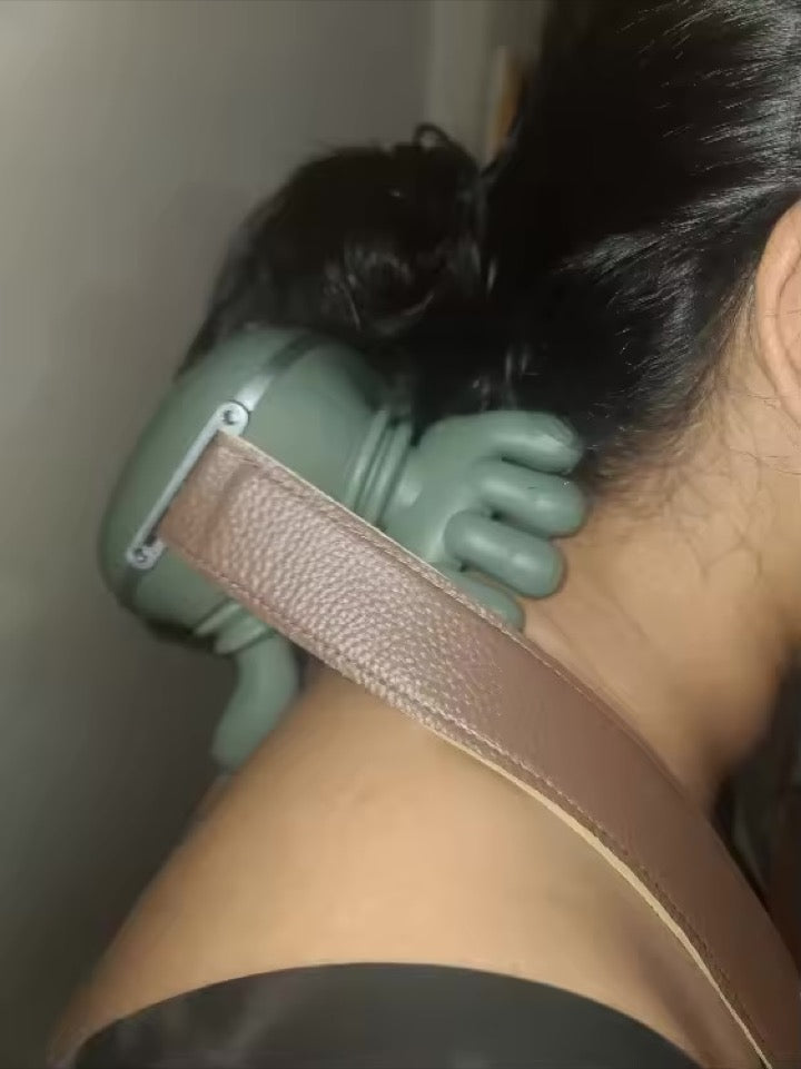 KneadFlow strapped on the back of a customer's neck