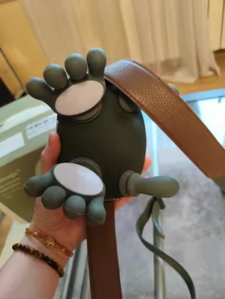 Customer holding the KneadFlow massager after unboxing